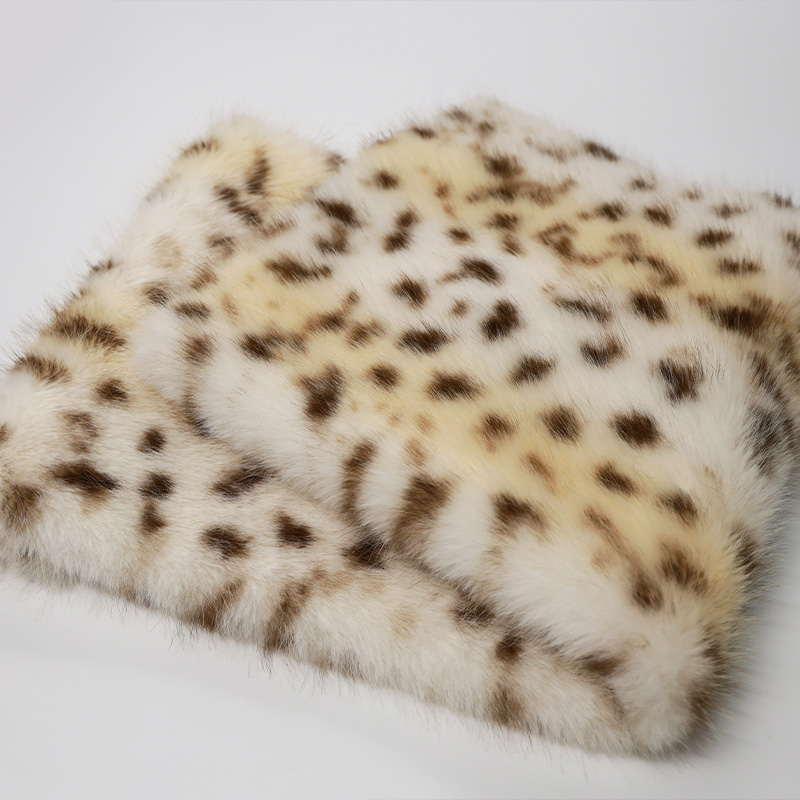 Off-white with yellow-brown leopard print