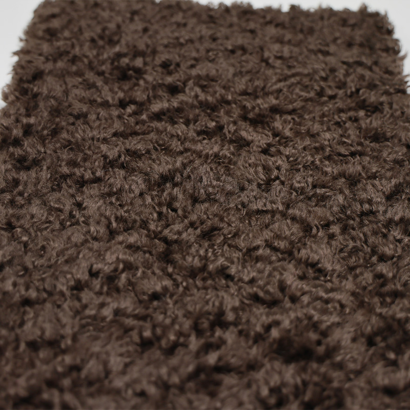 Dark brown little toka