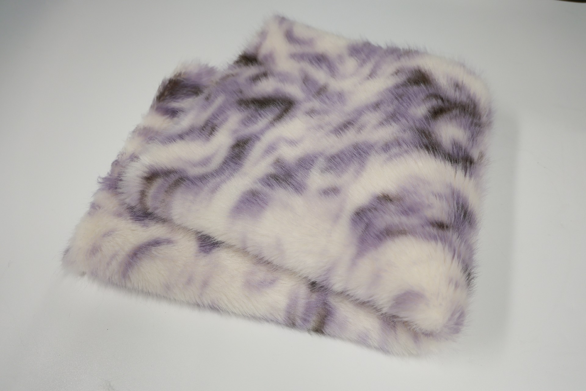 faux fox fur fabric with purple phoenix pattern