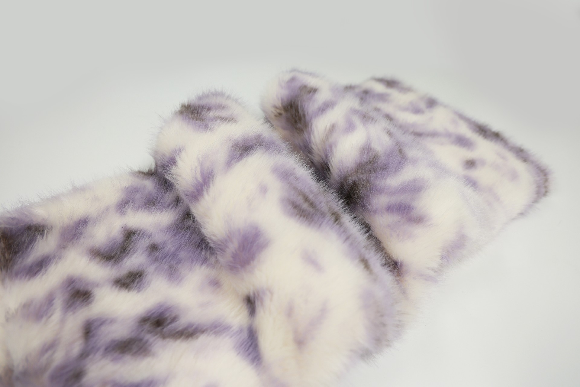 faux fox fur fabric with purple phoenix pattern