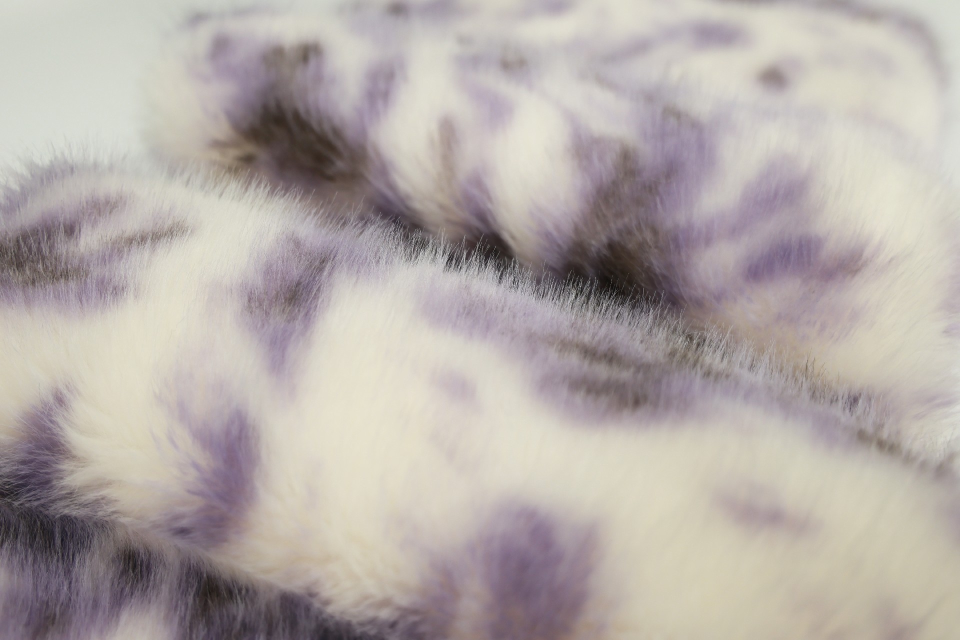 faux fox fur fabric with purple phoenix pattern
