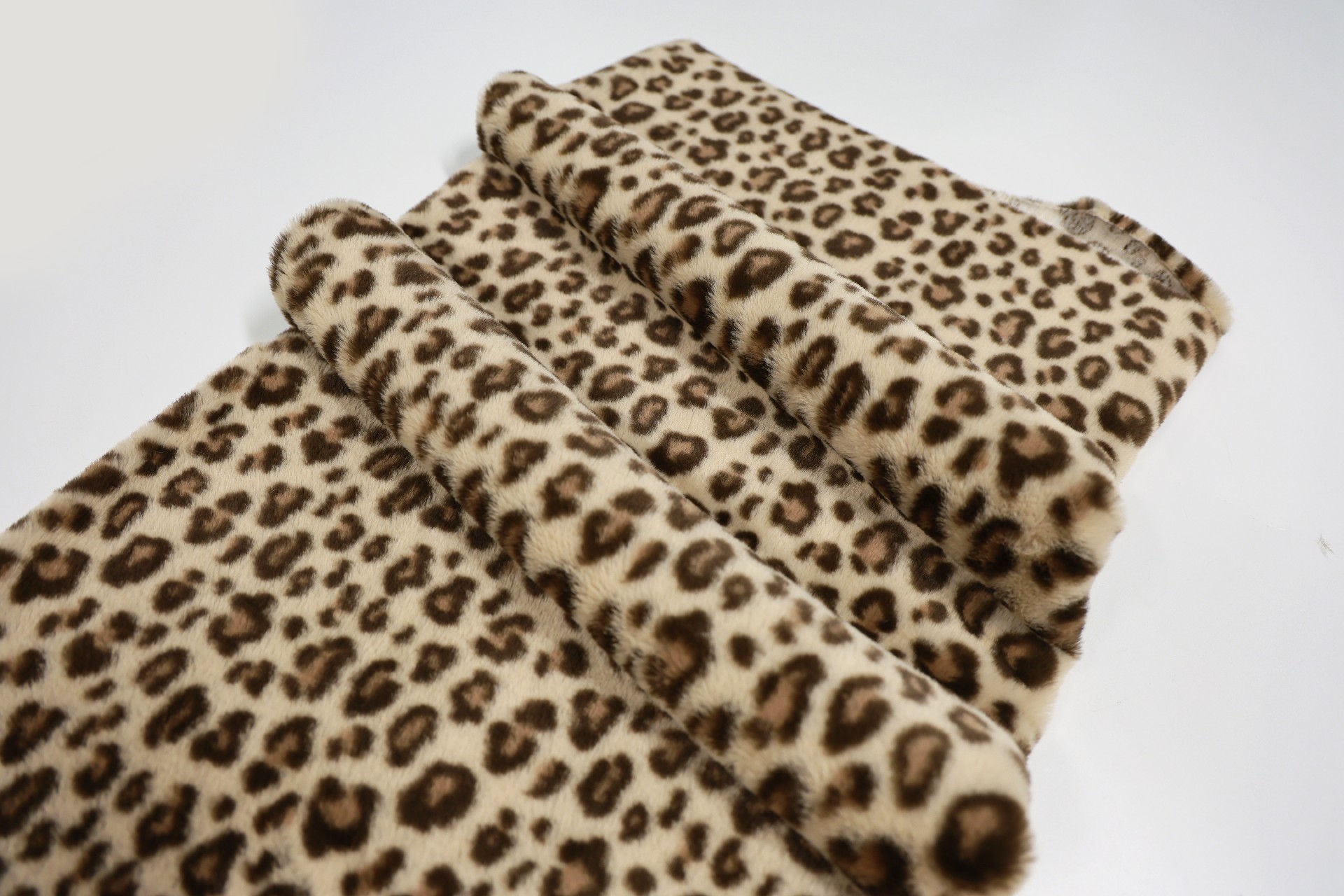 Brown 3-color printed leopard faux rabbit fur