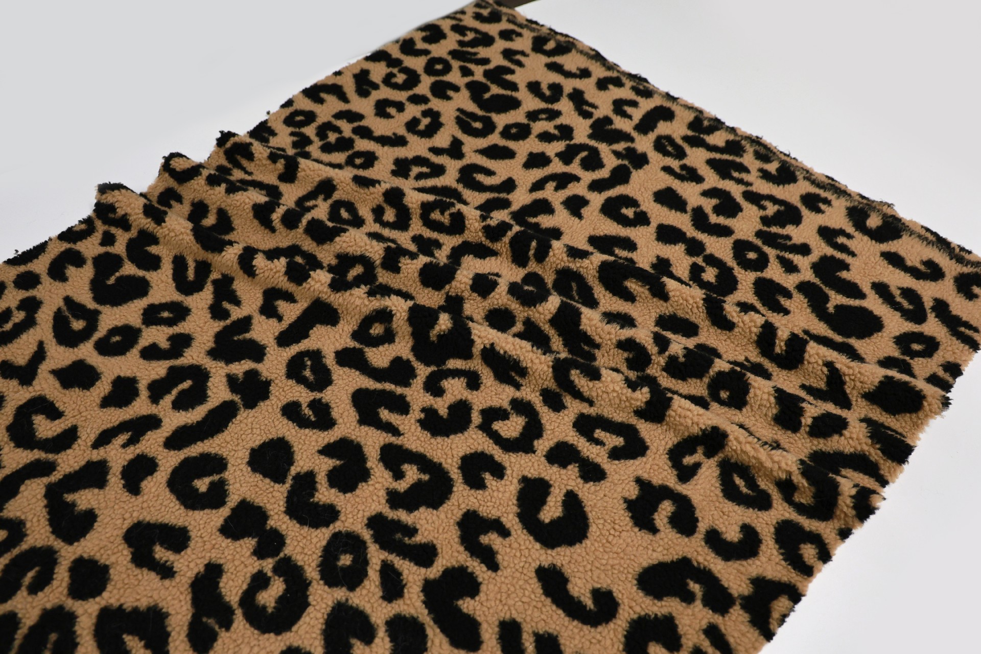 Brown and black leopard print lambskin