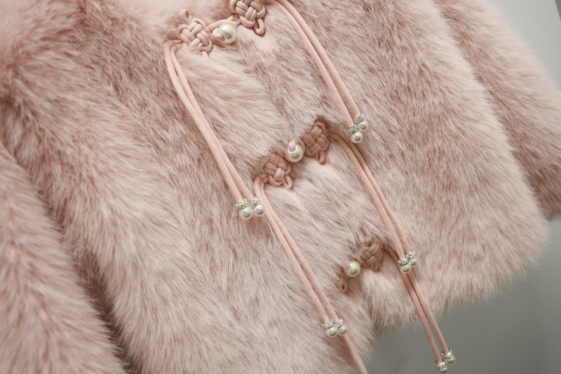 Female Fur Coats: A Guide from Clothing Design Manufacturers to Garments Products